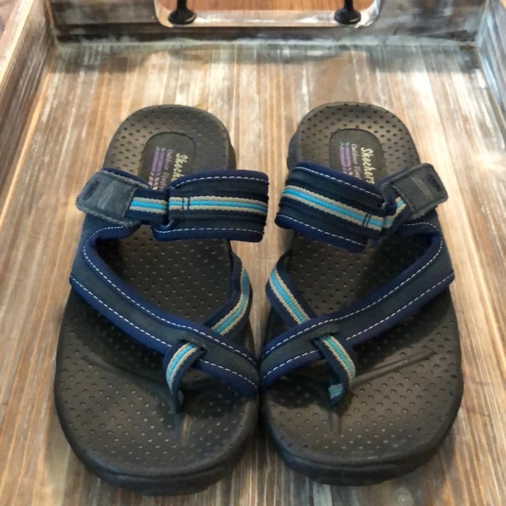 Sketchers.  Excellent used condition.
